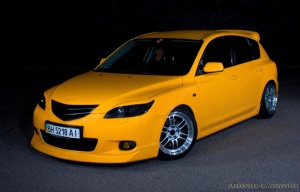 2005 Mazda Mazda3 with 17x9 Enkei RPF1 wheels