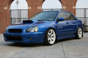 2005 Subaru Impreza WRX with 18x9.5 Rota Grids wheels