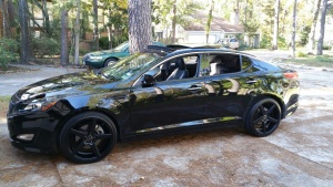 2012 Kia Optima with 20x8.5 KMC KM685 District wheels