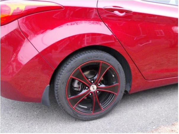 2011 Hyundai Elantra with 17x7 Dai Red Baron wheels