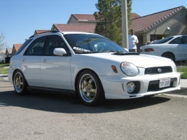 2003 Subaru Impreza with 17x7.5 Rota D2 wheels