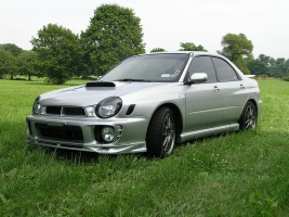 2003 Subaru Impreza with 17x8 Rota Torques wheels