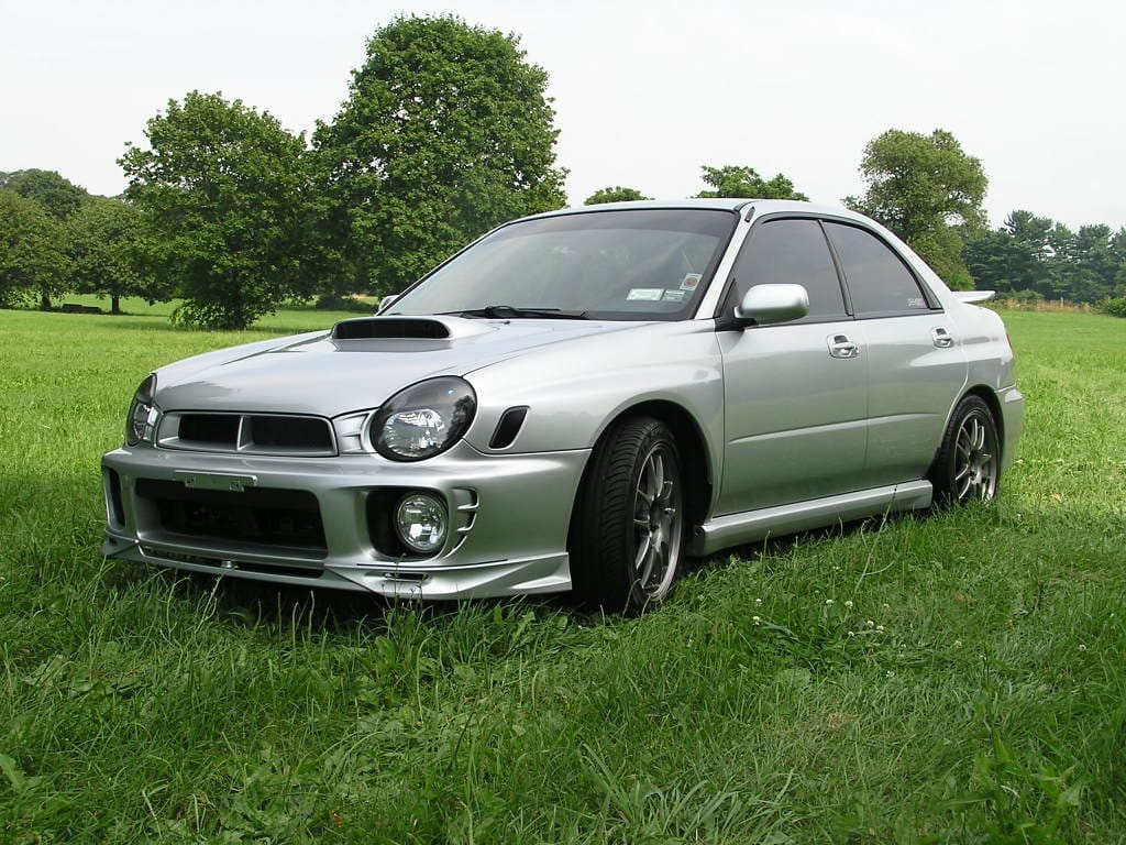 2003 Subaru Impreza with 17x8 Rota Torques wheels
