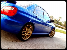 2006 Subaru Impreza with 18x8 Rota Torques wheels