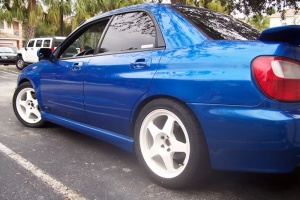 2003 Subaru Impreza with 17x8.5 Rota Slipstreams wheels