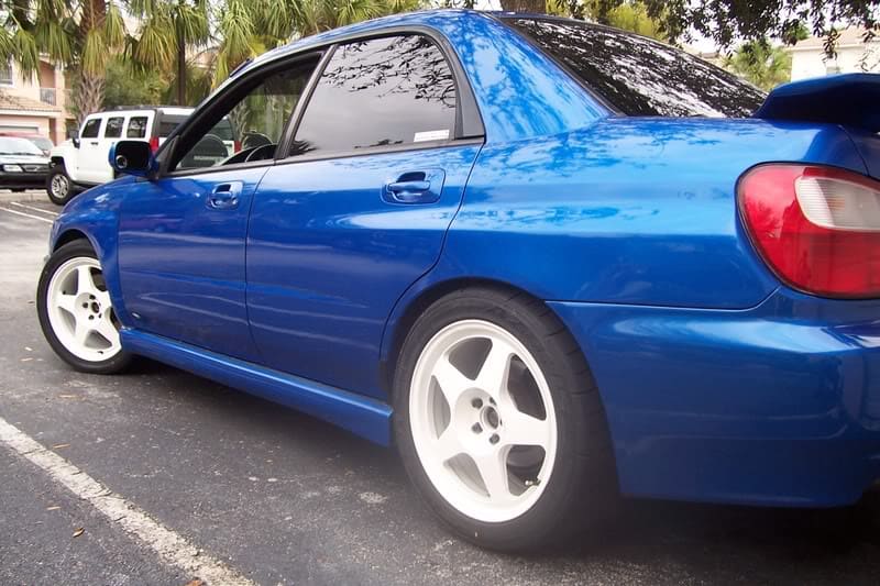2003 Subaru Impreza with 17x8.5 Rota Slipstreams wheels