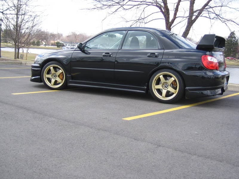 2002 Subaru Impreza with 18x8.5 Rota PF45S wheels