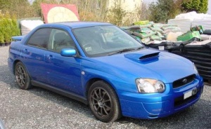2004 Subaru Impreza with 17x8 Rota G-Force wheels