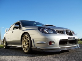 2006 Subaru Impreza with 18x8 Rota Torques wheels