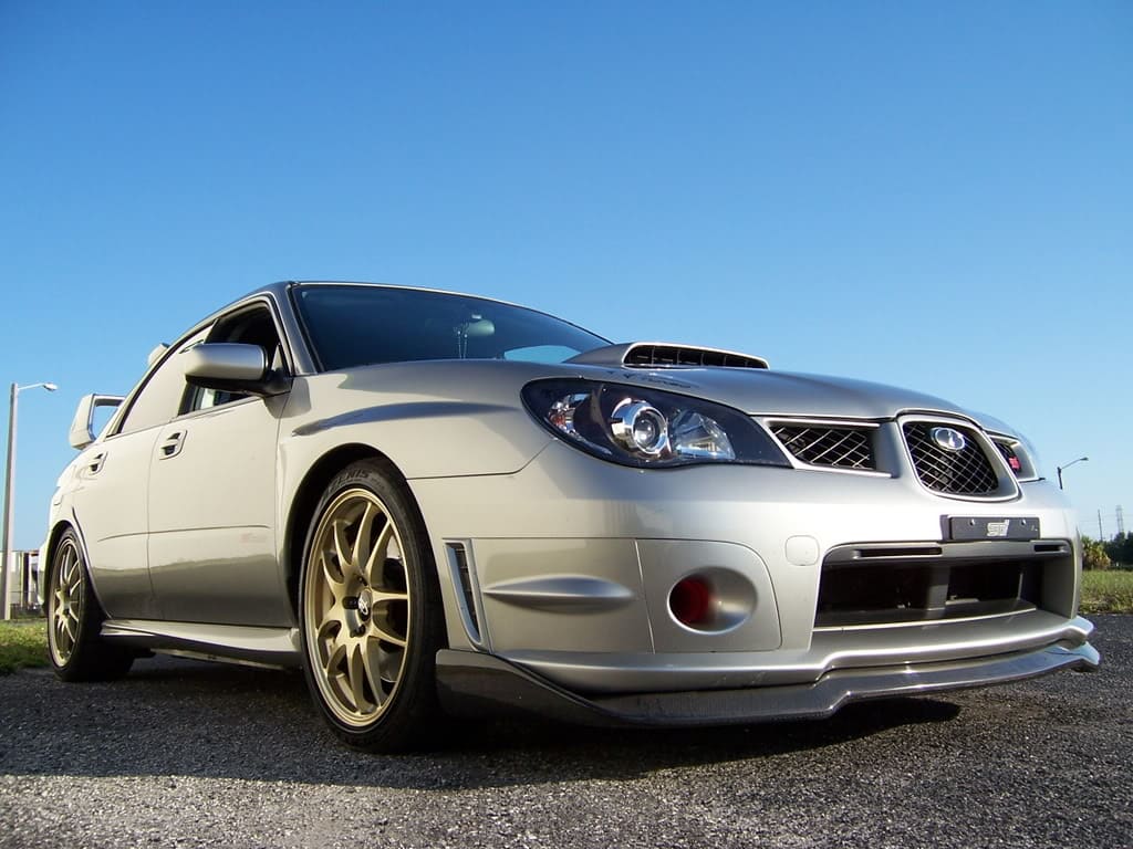 2006 Subaru Impreza with 18x8 Rota Torques wheels