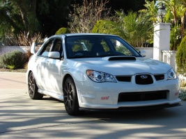 2006 Subaru Impreza with 17x8 Rota G-Force wheels