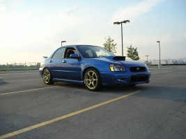 2004 Subaru Impreza with 17x8 Rota Boost wheels