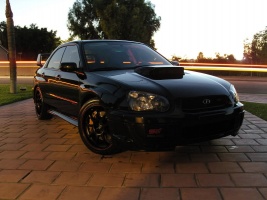 2005 Subaru Impreza with 18x8 Rota P1 wheels