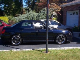 2002 Subaru Impreza WRX with 17x8.5 Advan wheels