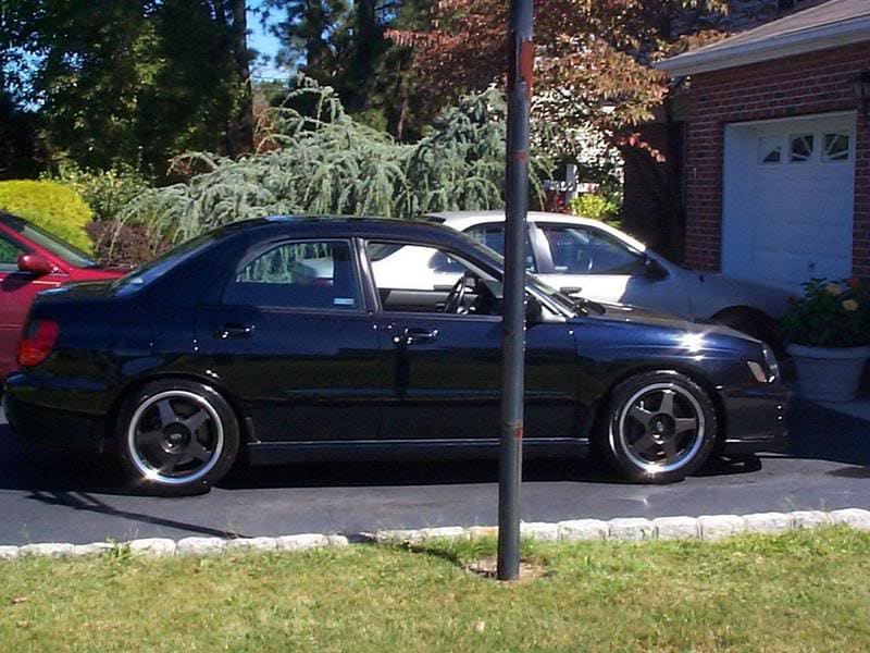 2002 Subaru Impreza WRX with 17x8.5 Advan wheels