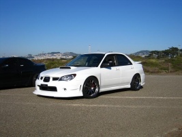 2007 Subaru Impreza with 18x9.5 Rota TorqueR wheels