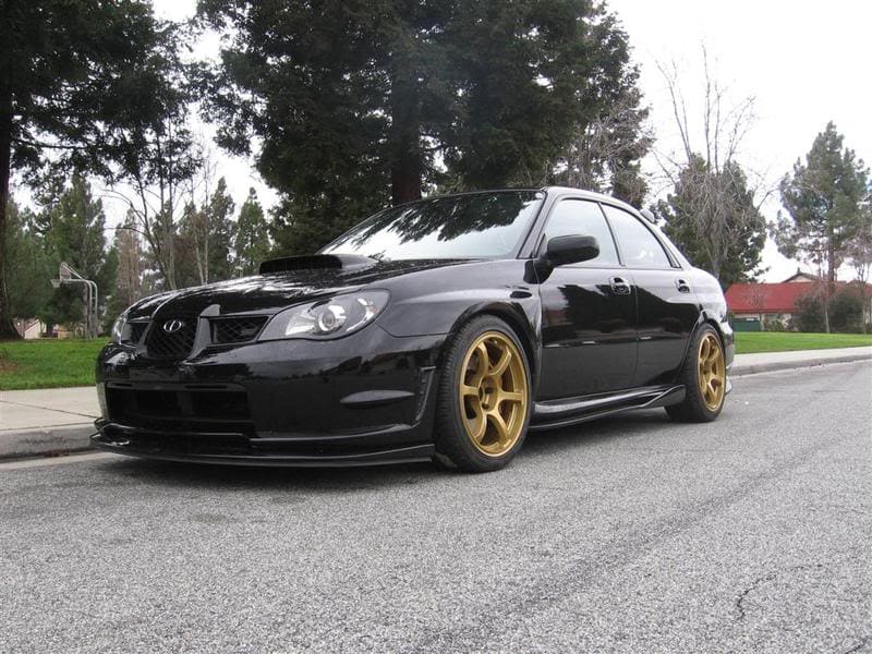 2007 Subaru Impreza with 18x9 Rota Boost wheels
