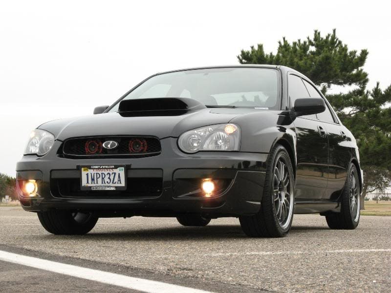 2004 Subaru Impreza with 18x8.5 Rota SVN wheels