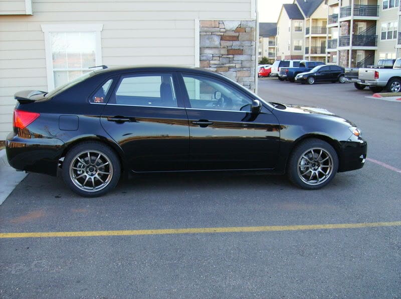 2008 Subaru Impreza with 17x8 Rota G-Force wheels