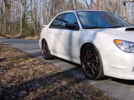 2006 Subaru Impreza with 18x8 Rota Torque Royal wheels