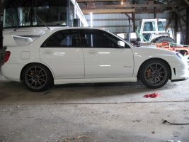 2006 Subaru Impreza with 18x8.5 Rota G-Force wheels
