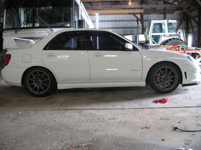 2006 Subaru Impreza with 18x8.5 Rota G-Force wheels