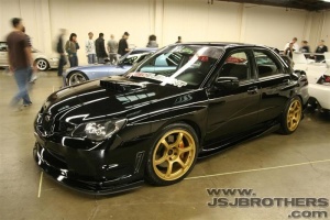2006 Subaru Impreza with 18x9 Rota Boost wheels
