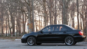 2004 Subaru Impreza with 18x8.5 Rota SVN wheels