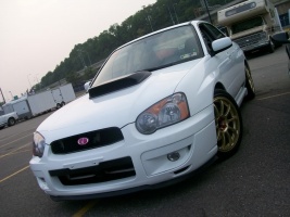 2004 Subaru Impreza with 17x8 Rota G-Force wheels