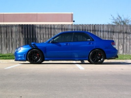 2006 Subaru Impreza with 17x8 Rota Torques wheels