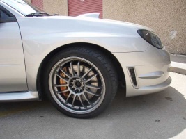 2007 Subaru Impreza with 18x8.5 Rota SVN wheels