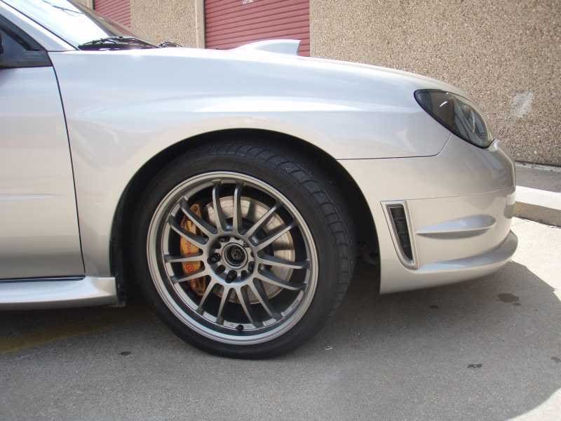 2007 Subaru Impreza with 18x8.5 Rota SVN wheels