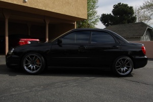 2004 Subaru Impreza with 18x9.5 Rota Torque-R wheels