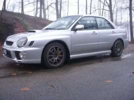 2003 Subaru Impreza with 17x8 Rota G-Force wheels