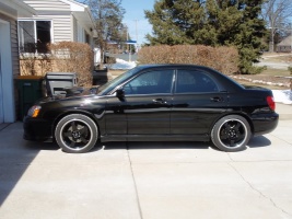 2004 Subaru Impreza with 18x8 Rota P45F wheels