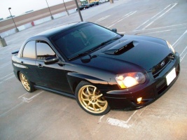 2004 Subaru Impreza with 18x8 Rota P1 wheels