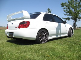2004 Subaru Impreza with 18x8.5 Rota G-Force wheels