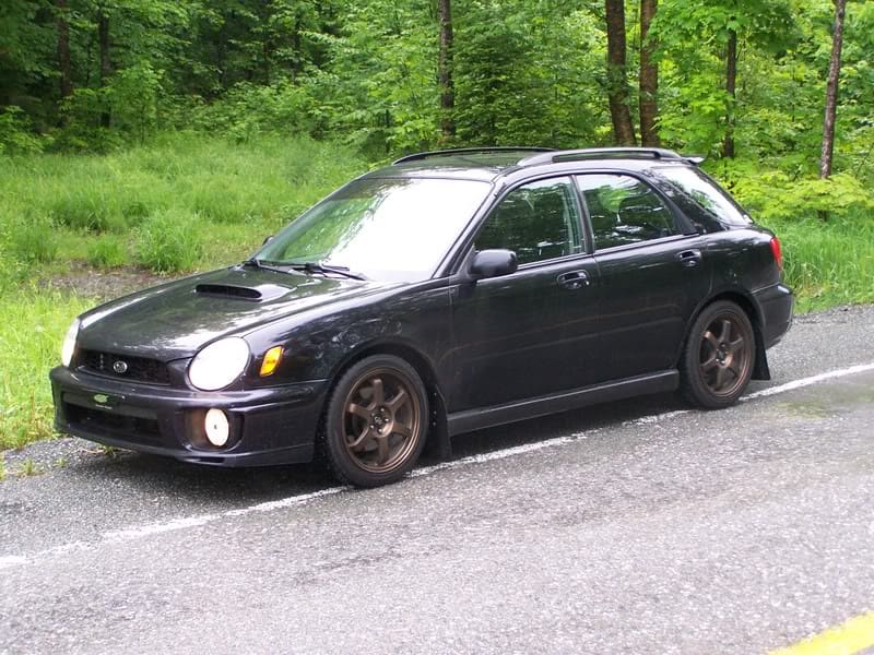 2002 Subaru Impreza with 17x7.5 Rota Royal Sport wheels