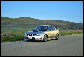 2006 Subaru Impreza with 18x8 Rota Tarmac 3 wheels