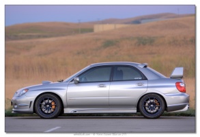 2006 Subaru Impreza with 17x8 Rota G-Force wheels