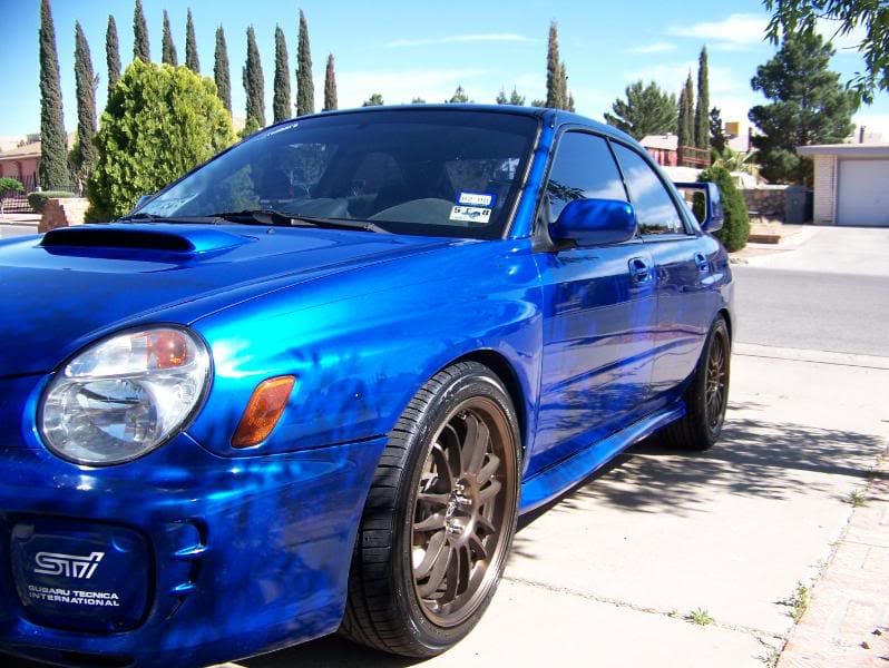 2003 Subaru Impreza with 18x8.5 Rota wheels