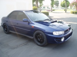2000 Subaru Impreza with 16x8 Rota Slipstream wheels