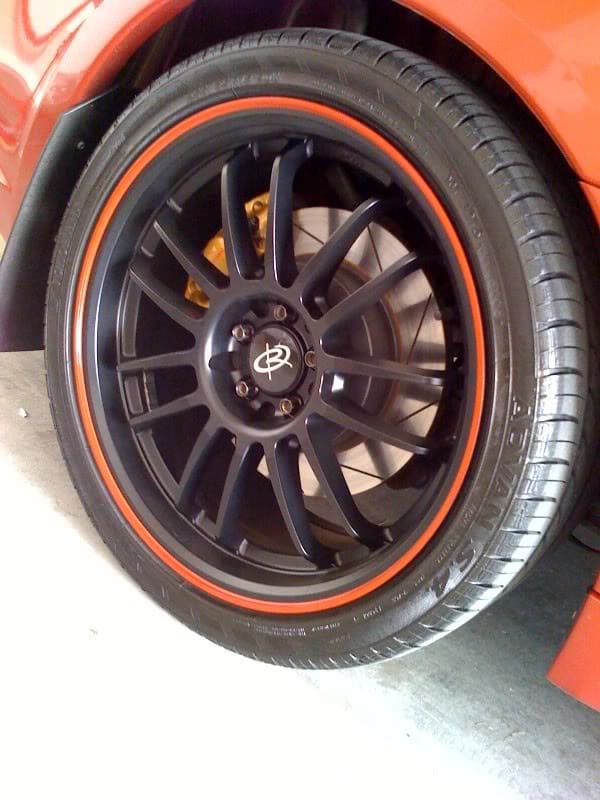 2005 Subaru Impreza with 18x8.5 Rota SVN wheels