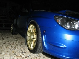 2004 Subaru Impreza with 18x9 Rota G-Force wheels