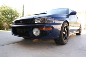 2000 Subaru Impreza with 16x8 Rota Slipstream wheels