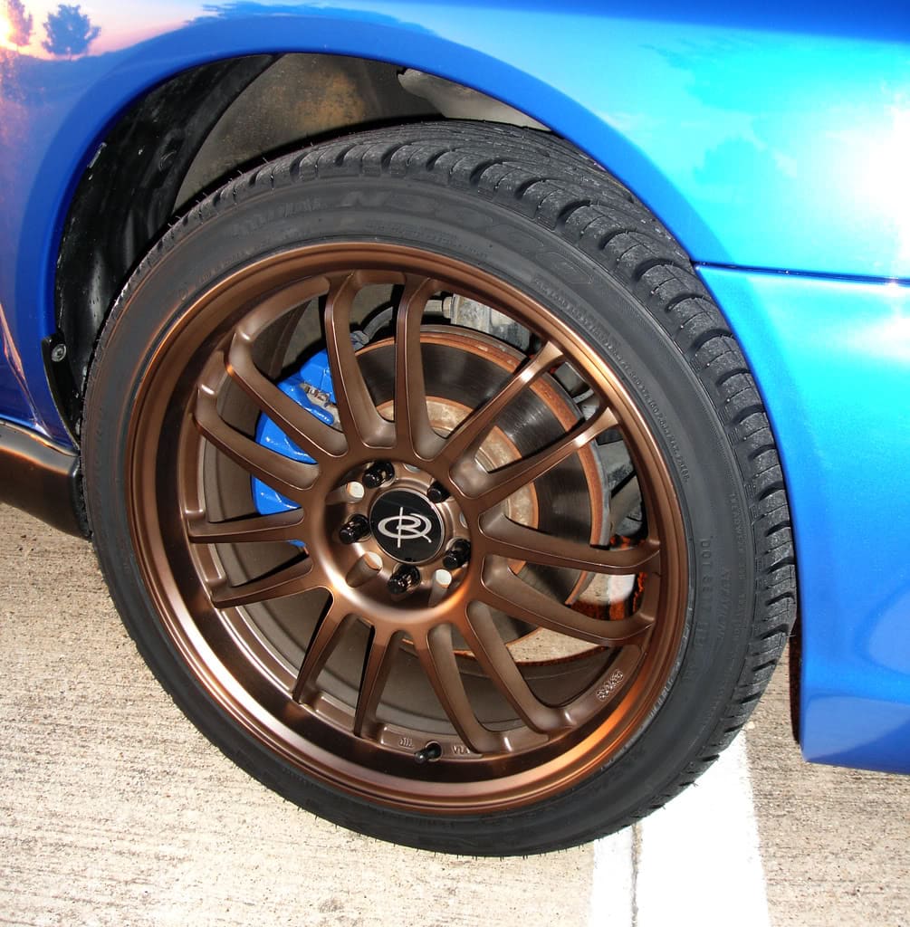 2004 Subaru Impreza with 18x8.5 Rota SVN wheels