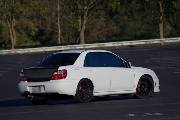 2006 Subaru Impreza with 18x8 Rota Torque wheels