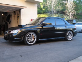 2006 Subaru Impreza with 18x8.5 Rota G-Force wheels