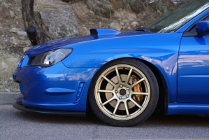 2007 Subaru Impreza with 18x9 Rota G-Force wheels