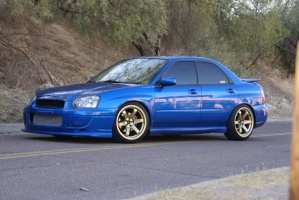 2004 Subaru Impreza with 18x9.5 Rota Grid wheels